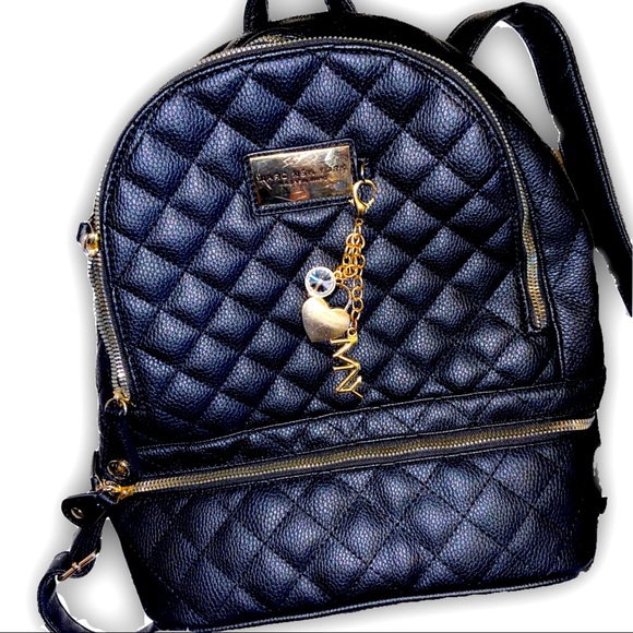 andrew marc backpack purse